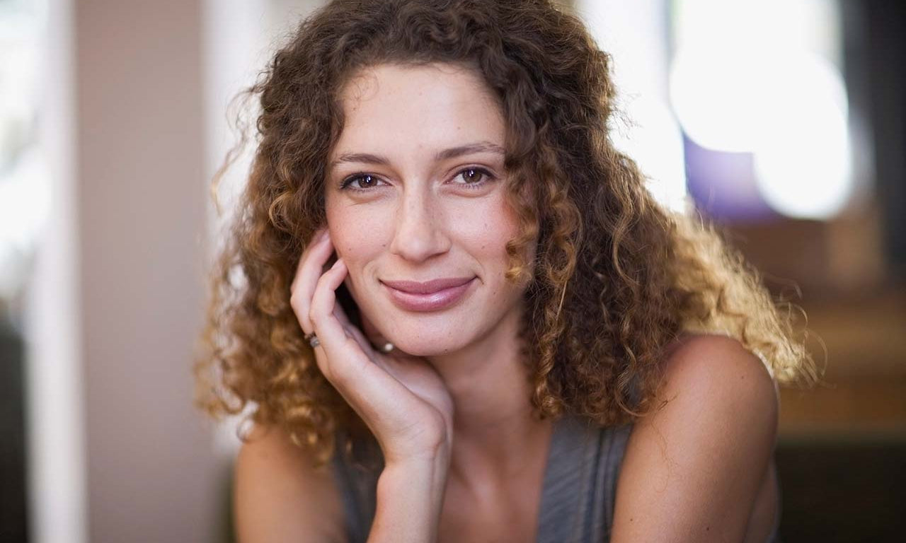Blond curly hair woman with matte eyeshadow