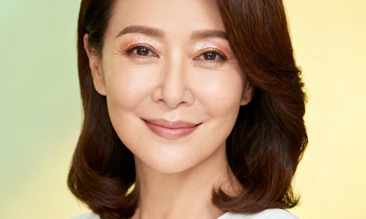 mature woman with eyeshadow shimmer makeup