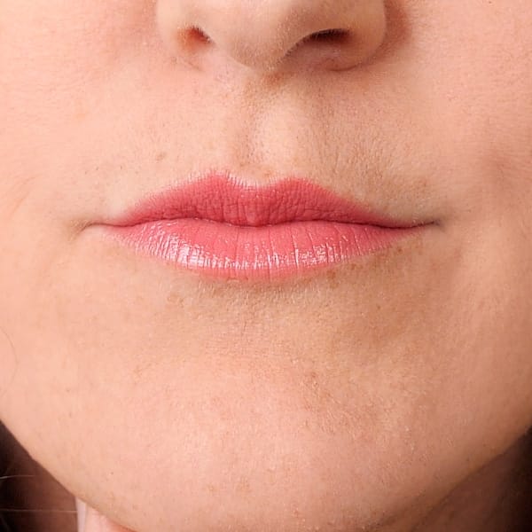 Close up of Andrea in Neutral Pink Lipstick Audrey