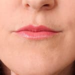 Close up Image of Andrea's Lips in neutral pink lipstick by Red Apple Lipstick