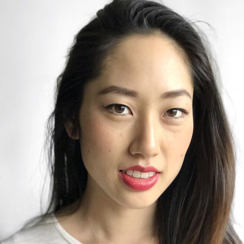 image of asian woman with light neutral skin wearing bold pink lipstick in unpinkable
