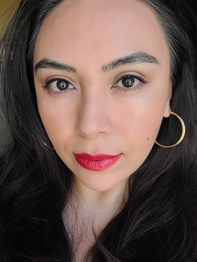 Image of female with long black hair, dark brown eyes wearing Red Apple Lipstick Eyeshadows in the shades Buttercream, Bronze Bombshell, Yes You Canyon, and Sand Castle. Black Eyeliner Pencil, The Lash Project Mascara. On her face and cheeks she is wearing Sundrop bronzer and Coy Blush