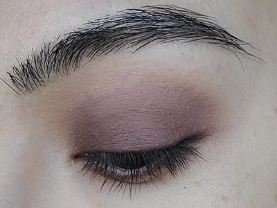 Image of close up eye lid with Hello Darkness eyeshadow by Red Apple Lipstick which was used to line the upper lash line. 