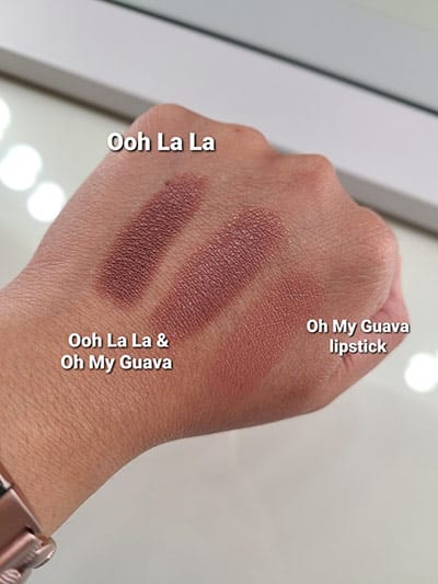 Image of the back of our models hand showing lipstick swatches in Ooh La La by itself, Ooh La La with Oh My Guava and Oh my Guava by itself. All by Red Apple Lipstick.