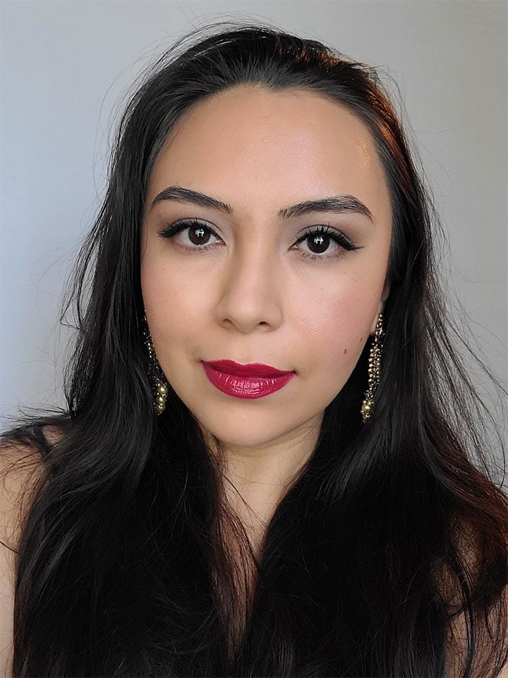image of a girl wearing wedding guest makeup winter
